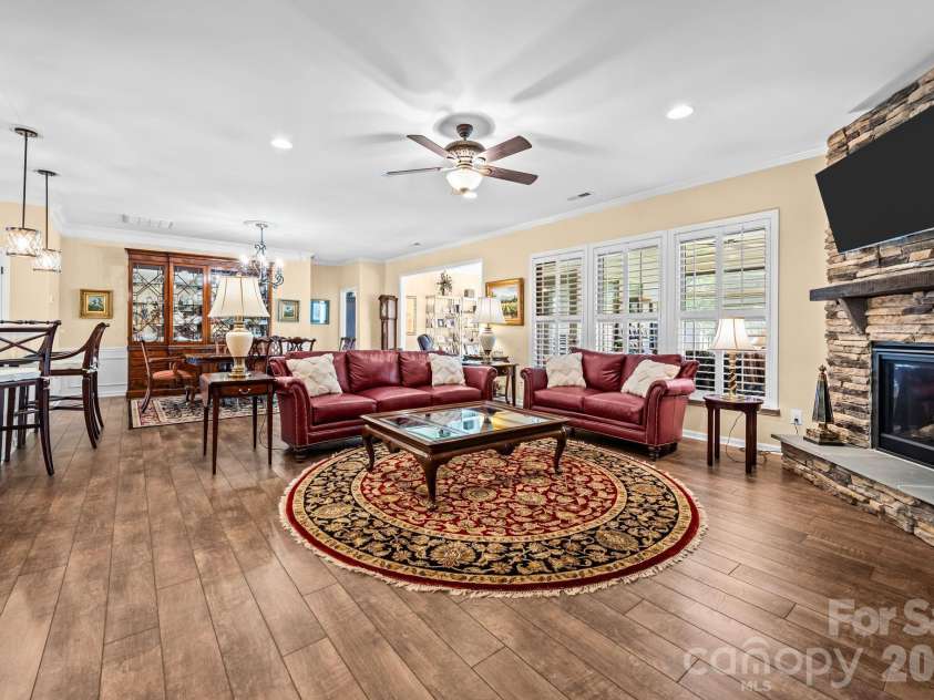 411 Haven Avenue, Fort Mill, SC 29715.  MLS# CAR4425938, YatesRealty ID 51714. Living room with fireplace