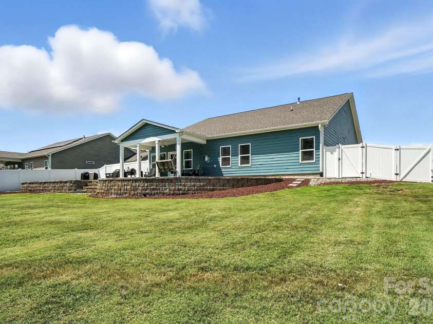 130 Sierra Chase Drive, Statesville, NC 28677.  MLS# CAR4425890, YatesRealty ID 51734. Backyard View