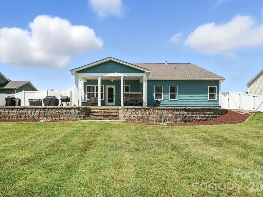 130 Sierra Chase Drive, Statesville, NC 28677.  MLS# CAR4425890, YatesRealty ID 51734. Backyard View