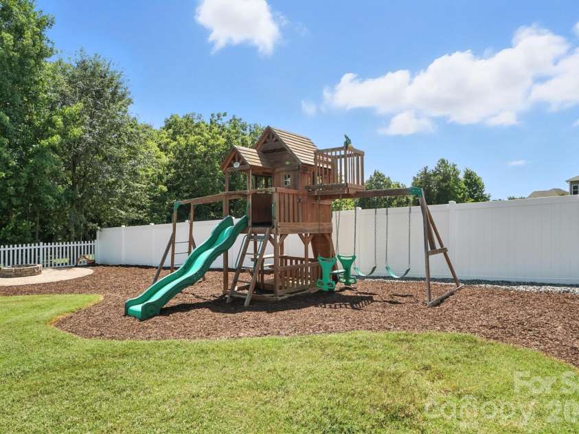 130 Sierra Chase Drive, Statesville, NC 28677.  MLS# CAR4425890, YatesRealty ID 51734. Backyard View