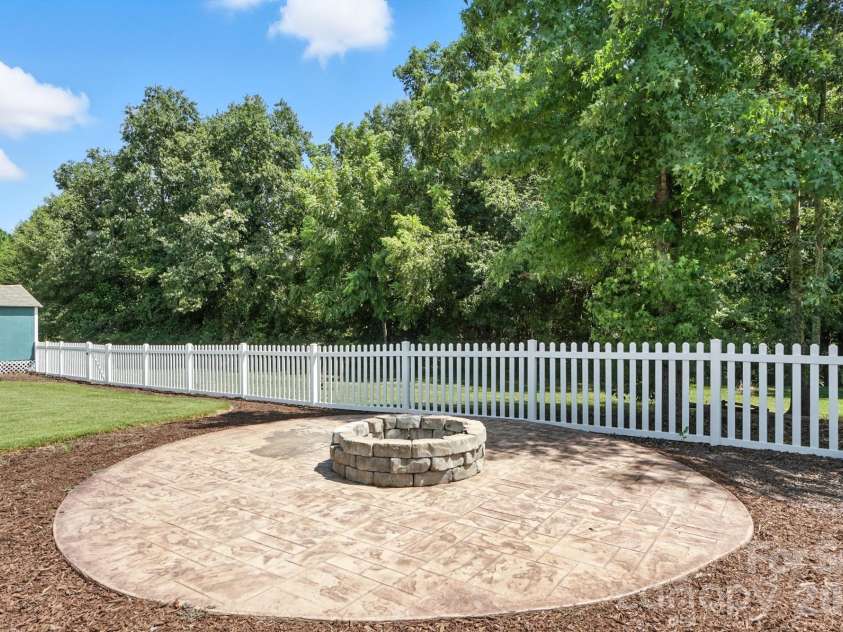 130 Sierra Chase Drive, Statesville, NC 28677.  MLS# CAR4425890, YatesRealty ID 51734. Concrete Firepit