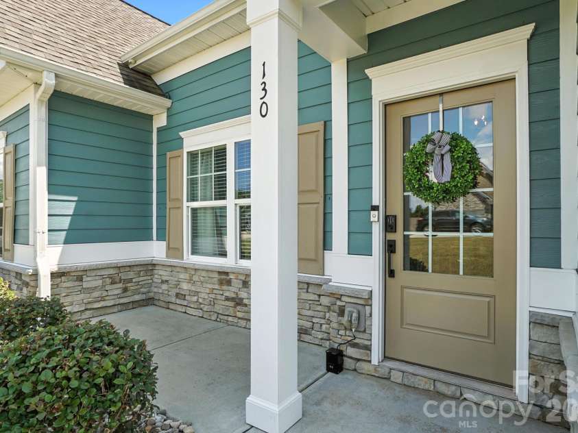 130 Sierra Chase Drive, Statesville, NC 28677.  MLS# CAR4425890, YatesRealty ID 51734. Covered Entry
