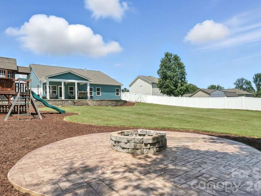 130 Sierra Chase Drive, Statesville, NC 28677.  MLS# CAR4425890, YatesRealty ID 51734. Firepit View