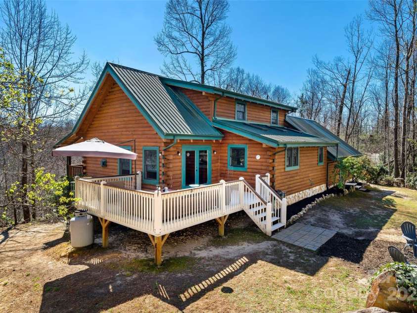 2245 Mckenzie Way, Old Fort, NC 28762.  MLS# CAR4240477, YatesRealty ID 5174. Covered front porch or an open deck for getting your vitamin D!