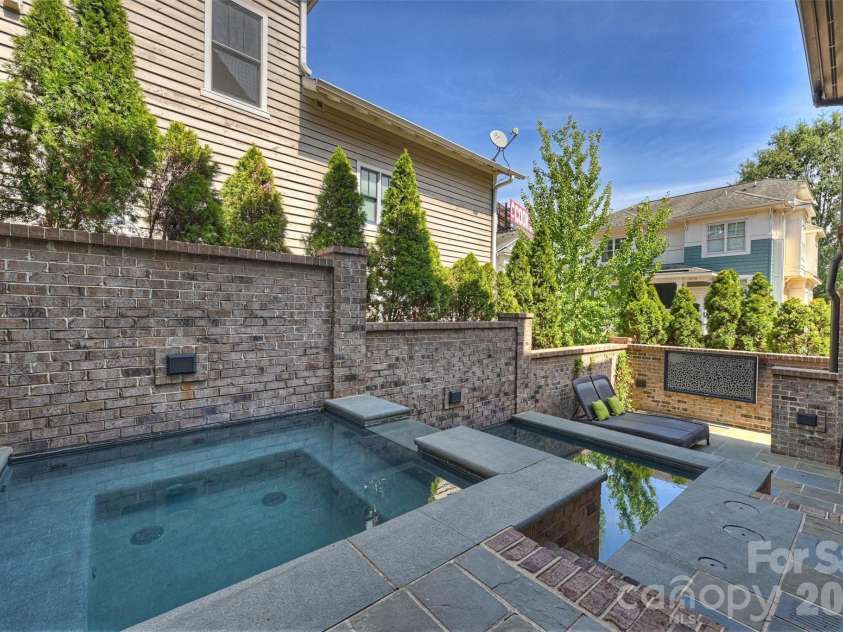423 Summit Avenue, Charlotte, NC 28208.  MLS# CAR4403714, YatesRealty ID 51742. Heated Pool & Spa