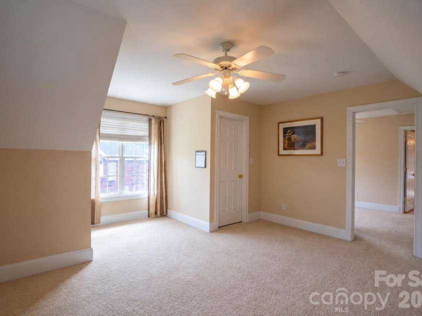 1927 Windmere Drive, Monroe, NC 28110.  MLS# CAR4418853, YatesRealty ID 51747. Large bonus room/flex space with walk in closet and floored attic storage