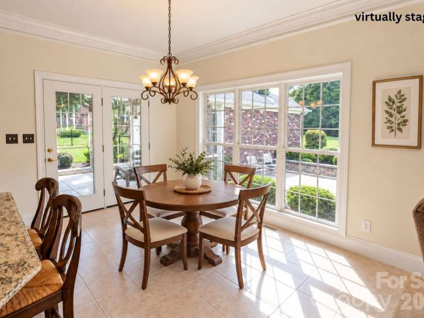 1927 Windmere Drive, Monroe, NC 28110.  MLS# CAR4418853, YatesRealty ID 51747. Virtually staged dining area