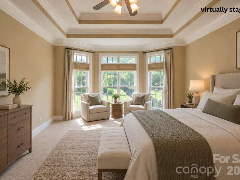 1927 Windmere Drive, Monroe, NC 28110.  MLS# CAR4418853, YatesRealty ID 51747. Virtually staged primary bedroom