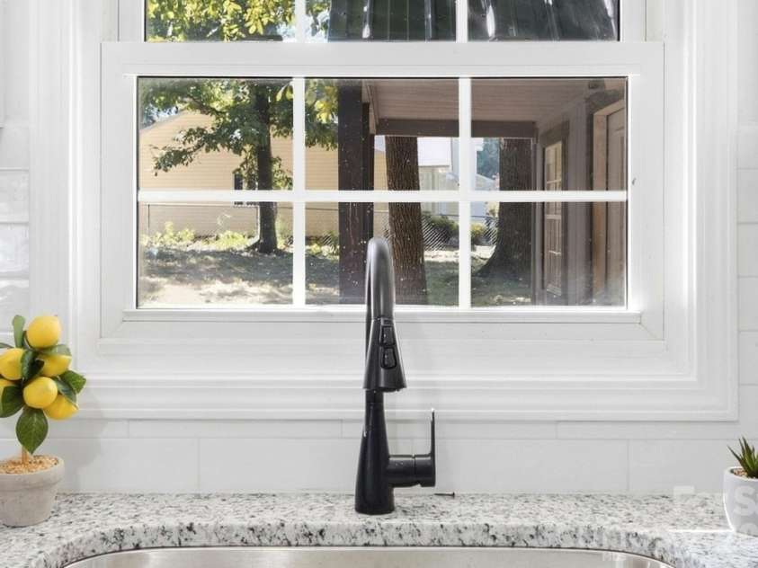 3231 Frazier Drive, Claremont, NC 28610.  MLS# CAR4426163, YatesRealty ID 51753. Sink overlooks backyard