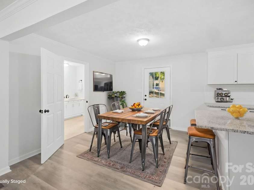 3231 Frazier Drive, Claremont, NC 28610.  MLS# CAR4426163, YatesRealty ID 51753. Virtually staged Kitchen and Dining Area