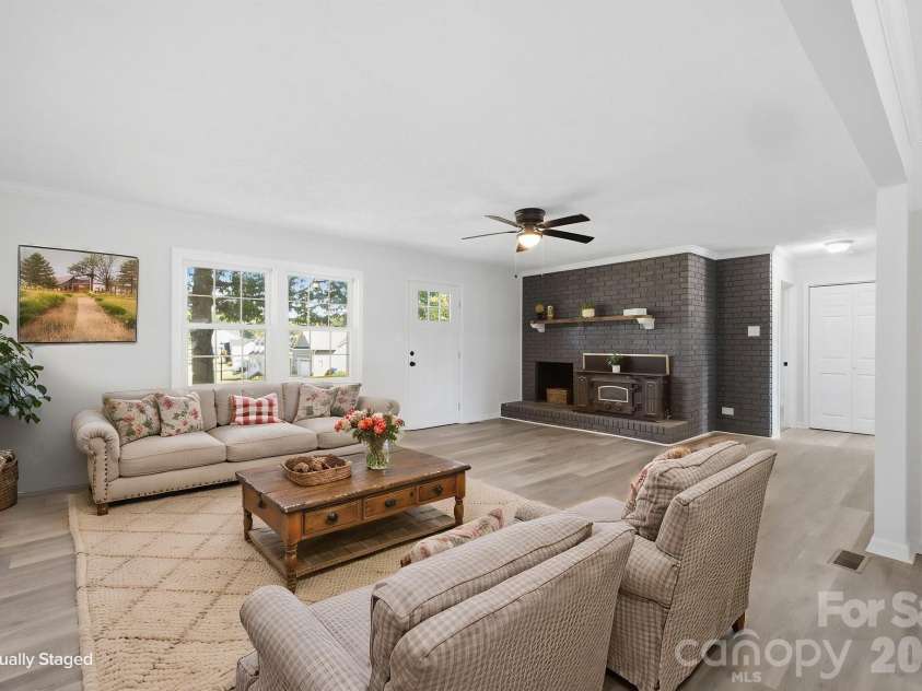 3231 Frazier Drive, Claremont, NC 28610.  MLS# CAR4426163, YatesRealty ID 51753. Virtually staged living room