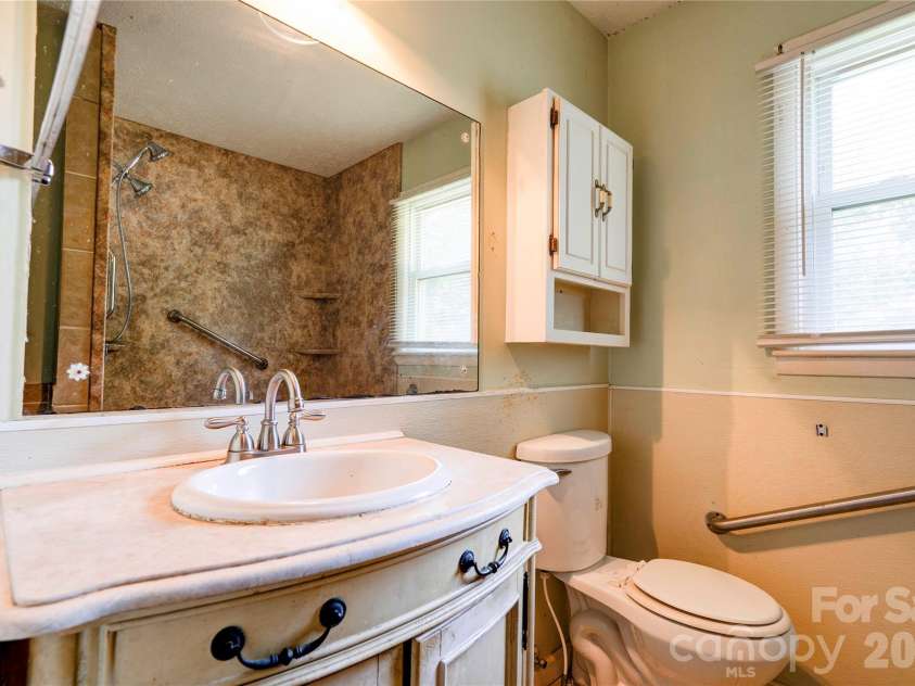 720 Levi Street, Shelby, NC 28152.  MLS# CAR4413161, YatesRealty ID 51754. Hall Bathroom