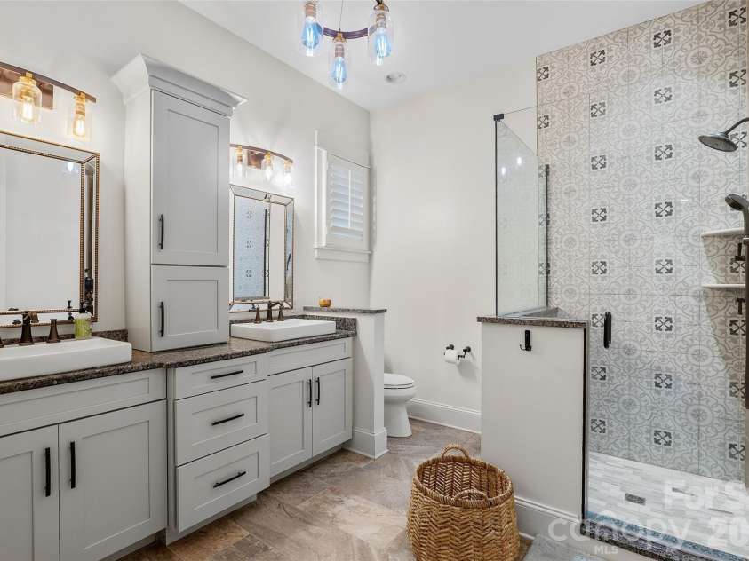 245 Rice Street, Brevard, NC 28712.  MLS# CAR4425712, YatesRealty ID 51775. Primary Bath