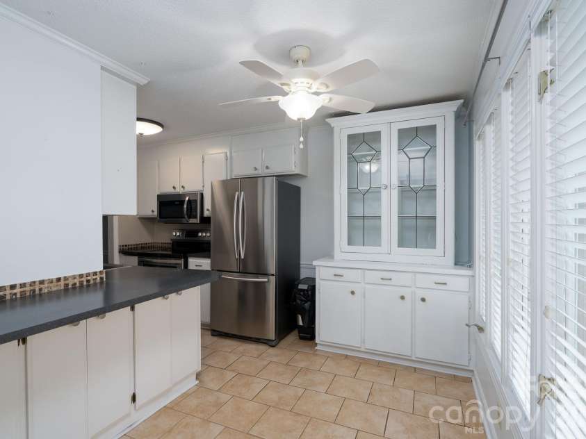 460 Camrose Circle, Concord, NC 28025.  MLS# CAR4426248, YatesRealty ID 51784. Breakfast Bar and China Cabinet