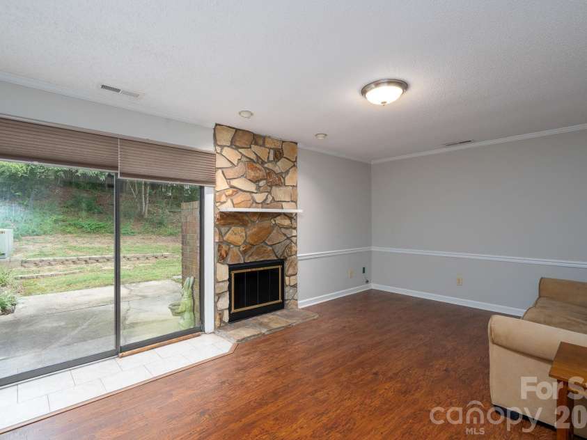 460 Camrose Circle, Concord, NC 28025.  MLS# CAR4426248, YatesRealty ID 51784. Living Room with rear view