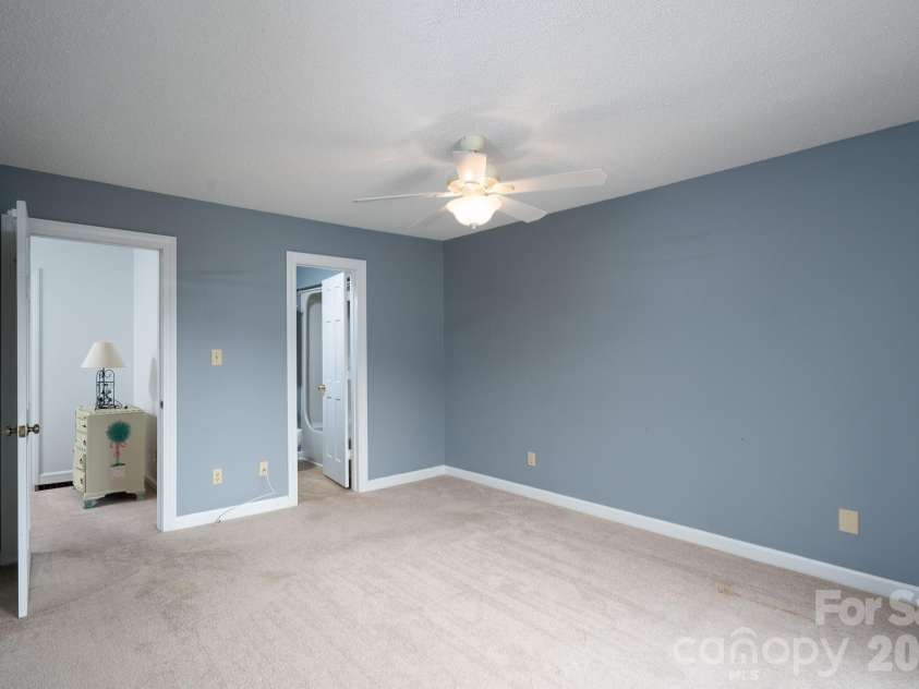 460 Camrose Circle, Concord, NC 28025.  MLS# CAR4426248, YatesRealty ID 51784. Primary Bedroom in the front showing private bath on right