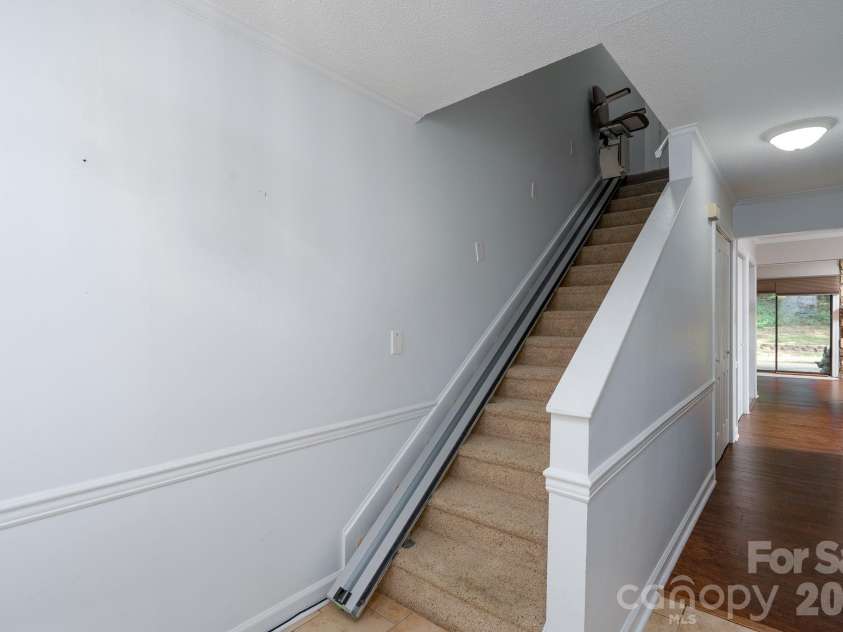 460 Camrose Circle, Concord, NC 28025.  MLS# CAR4426248, YatesRealty ID 51784. Staircase with Stairlift