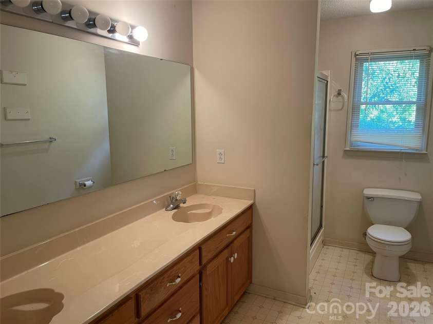 6630 Stevens Mill Road, Matthews, NC 28104.  MLS# CAR4403202, YatesRealty ID 51797. 