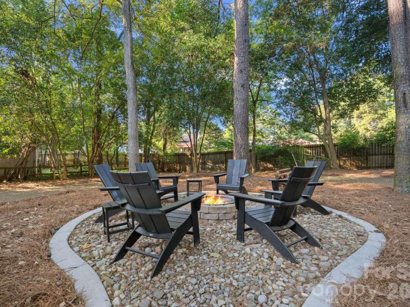 8331 Trail View Drive, Charlotte, NC 28226.  MLS# CAR4418749, YatesRealty ID 51810. Firepit in the backyard