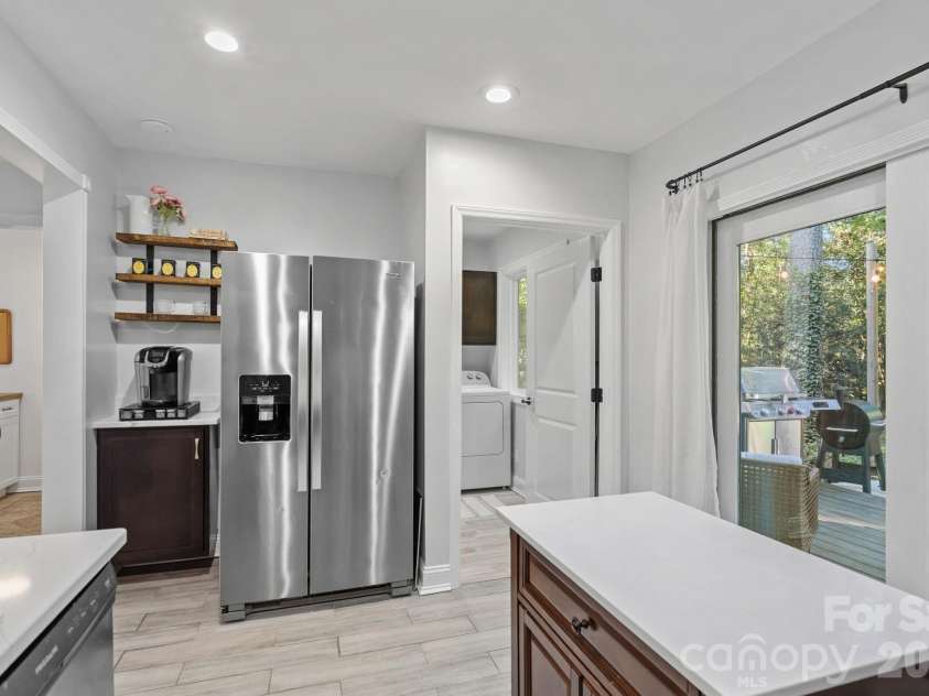 8331 Trail View Drive, Charlotte, NC 28226.  MLS# CAR4418749, YatesRealty ID 51810. Kitchen looking towards laundry room and back door