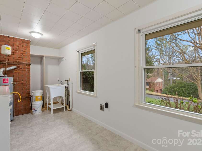 2 Fawn Drive, Asheville, NC 28803.  MLS# CAR4241539, YatesRealty ID 5182. Heated Laundry Room