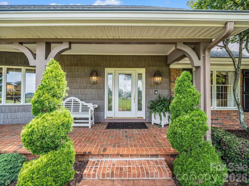 164 Brookfield Drive, Forest City, NC 28043.  MLS# CAR4425556, YatesRealty ID 51825. Front porch