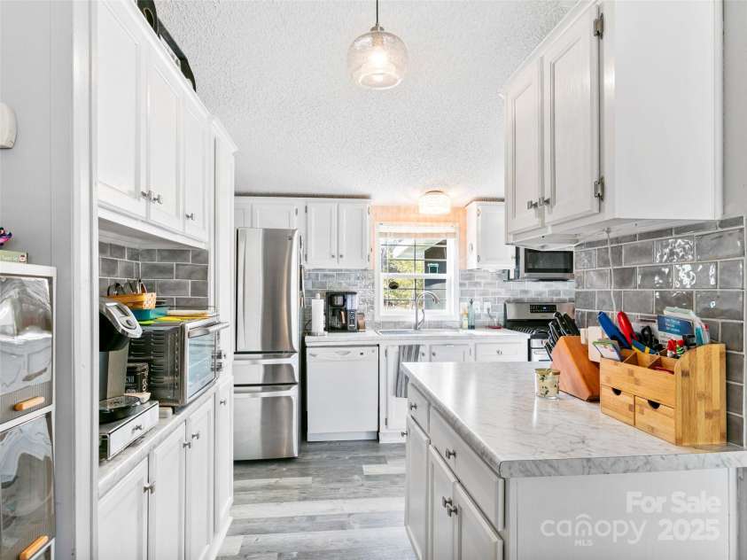 221 Misty Lane, Hendersonville, NC 28739.  MLS# CAR4221498, YatesRealty ID 5183. 