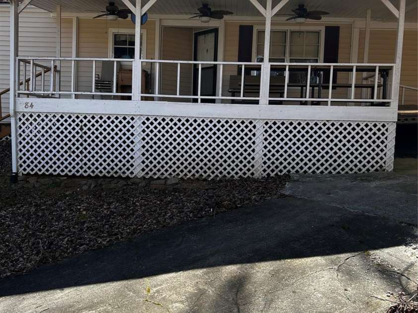 84 Greentree Lane, Canton, NC 28716.  MLS# CAR4239950, YatesRealty ID 5184. Great front covered porch seating area