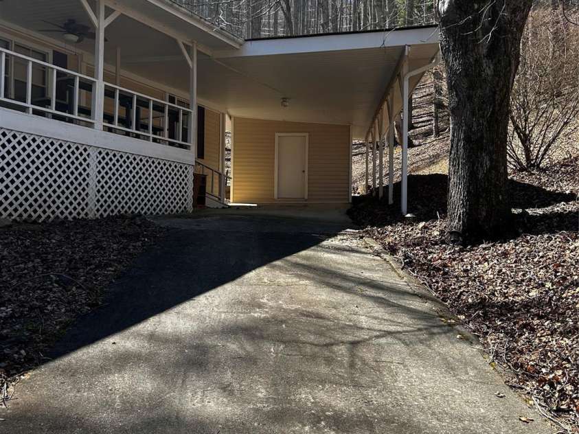 84 Greentree Lane, Canton, NC 28716.  MLS# CAR4239950, YatesRealty ID 5184. Plenty of parking and covered car port