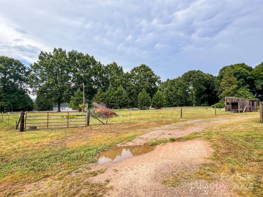 1470 River Hills Court, Taylorsville, NC 28681.  MLS# CAR4163155, YatesRealty ID 5185. Former MH park- fenced pasture area