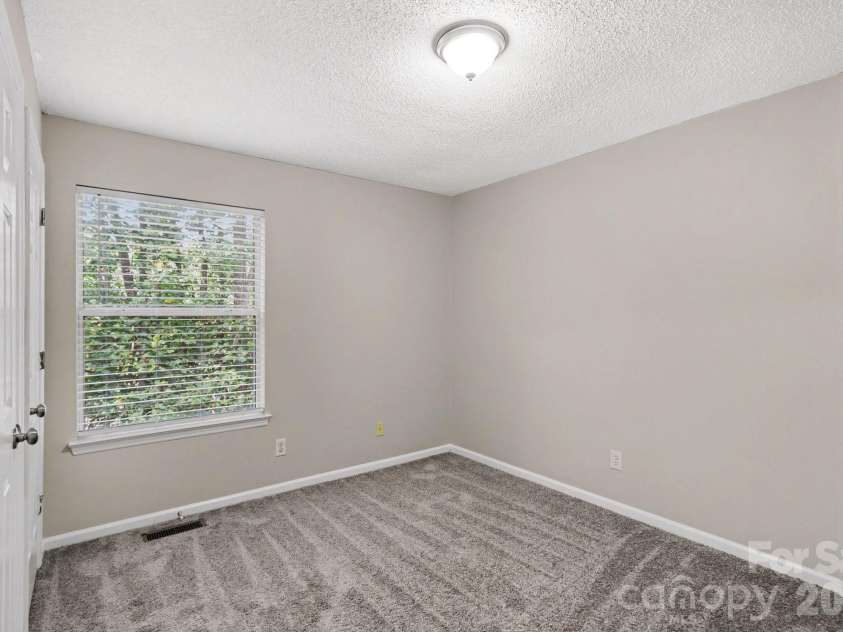 8313 Belstead Brook Court, Charlotte, NC 28216.  MLS# CAR4423497, YatesRealty ID 51863. 