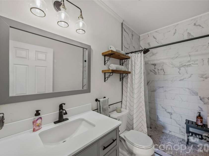 8315 Harvell Road, Stanfield, NC 28163.  MLS# CAR4426135, YatesRealty ID 51929. Renovated secondary bathroom