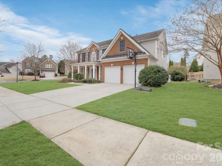 1274 Sandy Bottom Drive, Concord, NC 28027.  MLS# CAR4353782, YatesRealty ID 5193. Grass digitally enhanced)