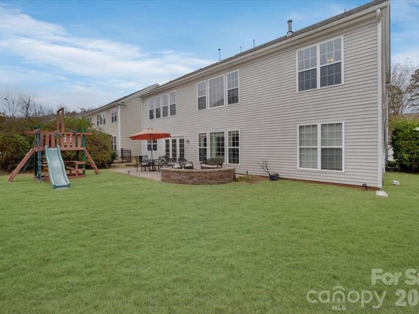 1274 Sandy Bottom Drive, Concord, NC 28027.  MLS# CAR4353782, YatesRealty ID 5193. Grass digitally enhanced