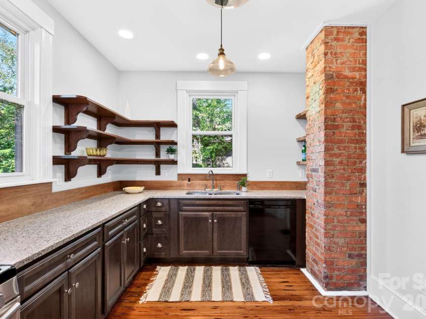 16 West Street, Asheville, NC 28801.  MLS# CAR4423666, YatesRealty ID 51960. Exposed Brick
