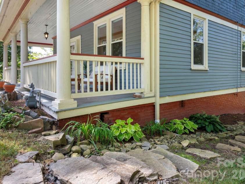 16 West Street, Asheville, NC 28801.  MLS# CAR4423666, YatesRealty ID 51960. Exterior steps to back yard