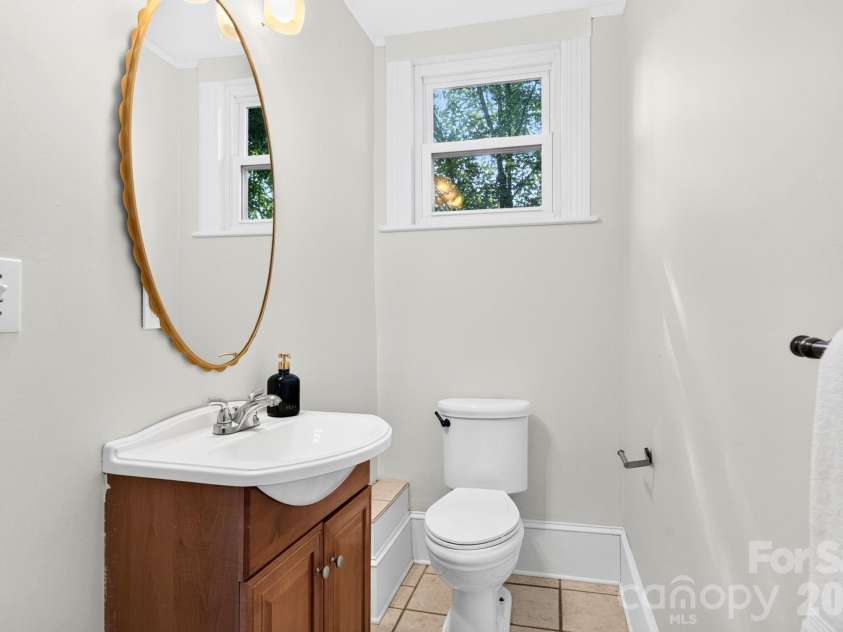 16 West Street, Asheville, NC 28801.  MLS# CAR4423666, YatesRealty ID 51960. Half Guest Bath on Main Level