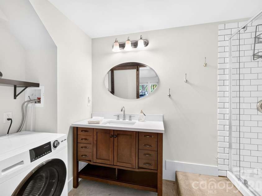 16 West Street, Asheville, NC 28801.  MLS# CAR4423666, YatesRealty ID 51960. Lower Level Laundry