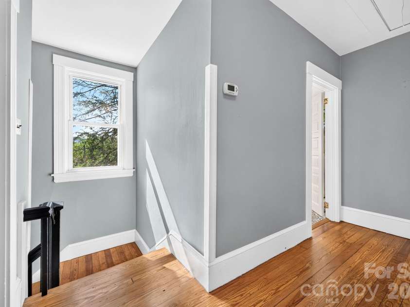 16 West Street, Asheville, NC 28801.  MLS# CAR4423666, YatesRealty ID 51960. Upper Level Landing