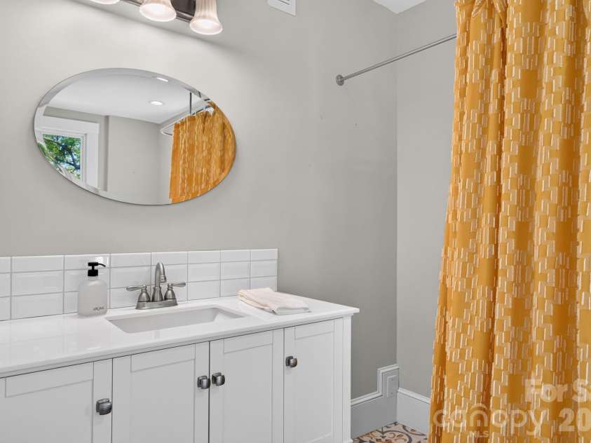 16 West Street, Asheville, NC 28801.  MLS# CAR4423666, YatesRealty ID 51960. Vanity
