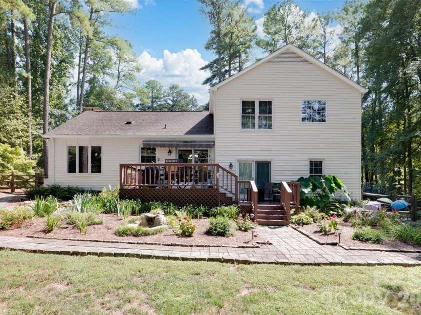95 Scalybark Trail, Concord, NC 28027.  MLS# CAR4422844, YatesRealty ID 51966. Fenced in backyard with beautiful landscaping.