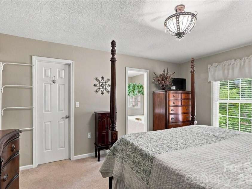 95 Scalybark Trail, Concord, NC 28027.  MLS# CAR4422844, YatesRealty ID 51966. Primary bedroom
