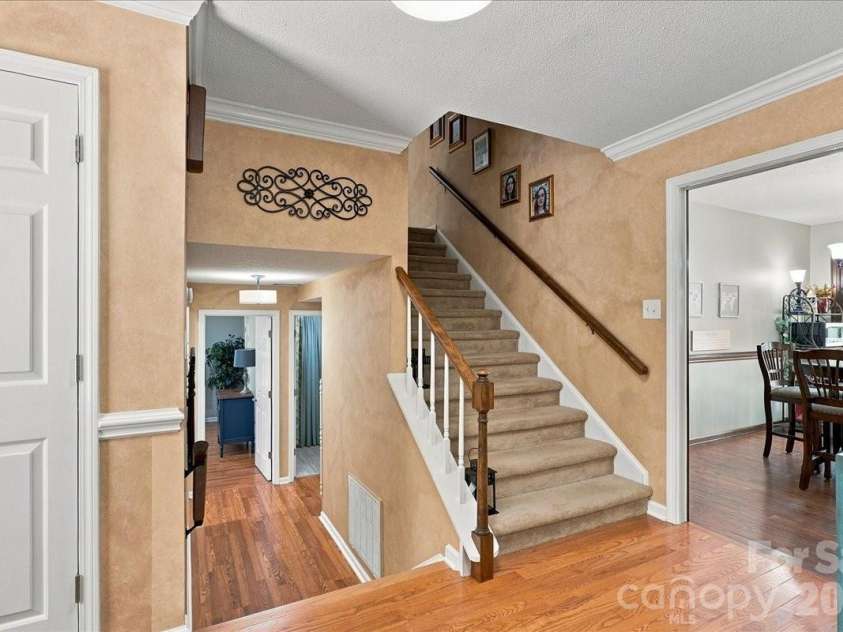 95 Scalybark Trail, Concord, NC 28027.  MLS# CAR4422844, YatesRealty ID 51966. Three levels in this beautiful split level home