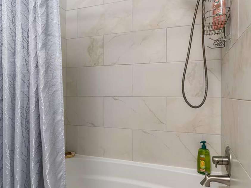 124 Oak Hill Road, Candler, NC 28715.  MLS# CAR4346369, YatesRealty ID 5197. Guest Bath