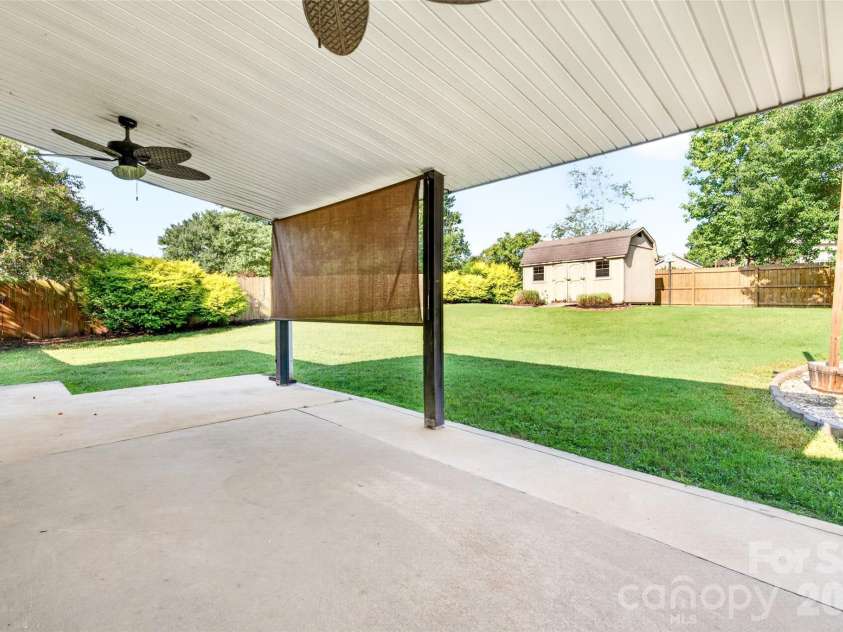 267 Carrington Lane, Salisbury, NC 28146.  MLS# CAR4421165, YatesRealty ID 51971. Back patio - covered