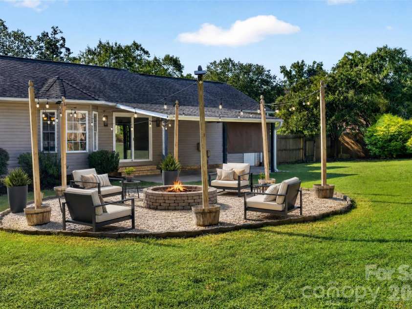 267 Carrington Lane, Salisbury, NC 28146.  MLS# CAR4421165, YatesRealty ID 51971. Virtually enhanced - fire pit area