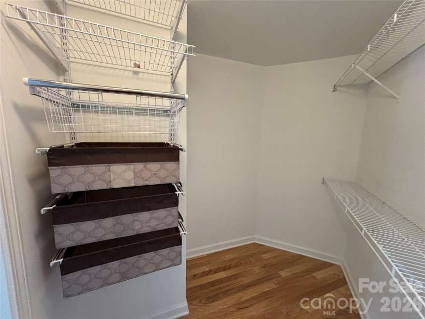 1332 Torrence Circle, Davidson, NC 28036.  MLS# CAR4422465, YatesRealty ID 51983. Nice sized walk-in closet.