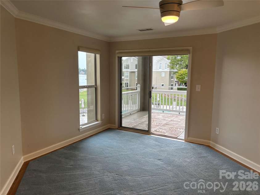 1332 Torrence Circle, Davidson, NC 28036.  MLS# CAR4422465, YatesRealty ID 51983. Primary bedroom views of the lake from here.