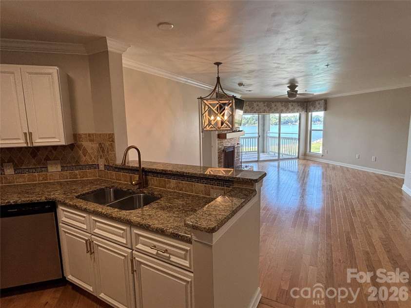 1332 Torrence Circle, Davidson, NC 28036.  MLS# CAR4422465, YatesRealty ID 51983. You can see the lake from your Kitchen!