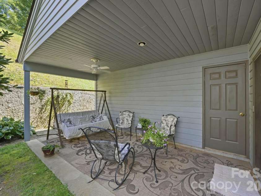 310 Robertson Street, Burnsville, NC 28714.  MLS# CAR4424794, YatesRealty ID 51987. Back patio
